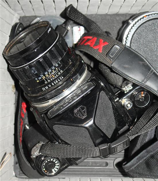 An Asahi Pentax 6 x 7 format camera and a Pentax 67 II camera and lenses,